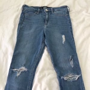 Ripped high rise blue jeans